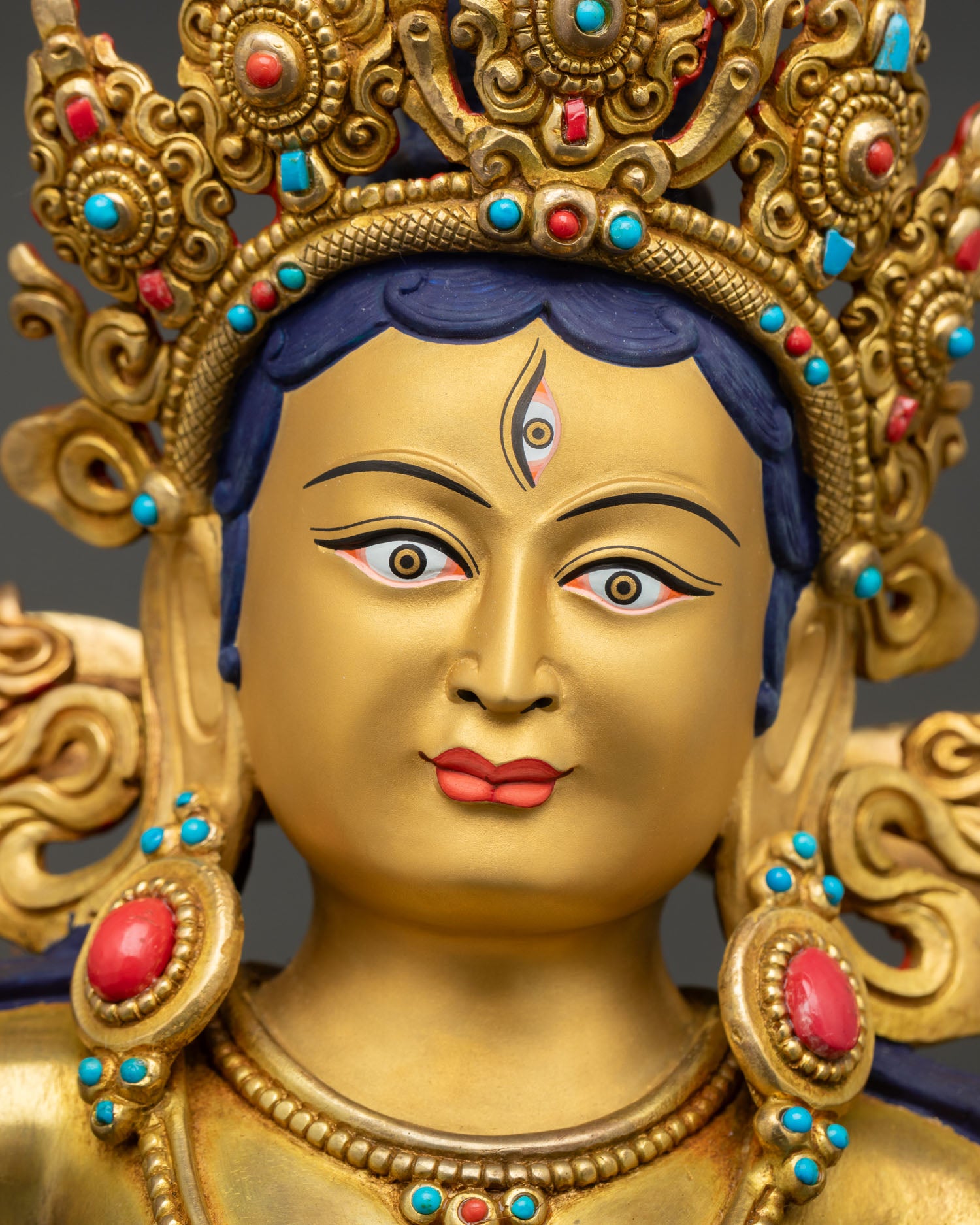 detailed close up face, machig labdron face with gold painted features, semi-precious stone accents and finely carved expression