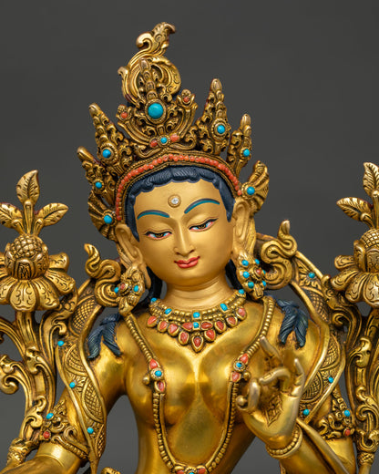detailed close up green tara bodhisattva statue facial expression and crown art