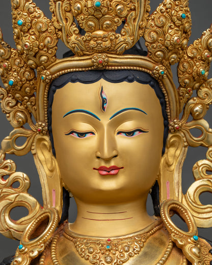 Detailed close up of Dukar Sitatapatra statue's serene gold painted face, Nepal