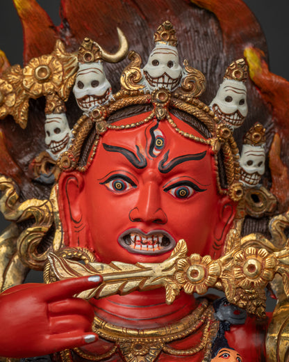 Detailed close up of Kurukulla Statue face, painted in acrylic colors, third fierce eye, flaming hair