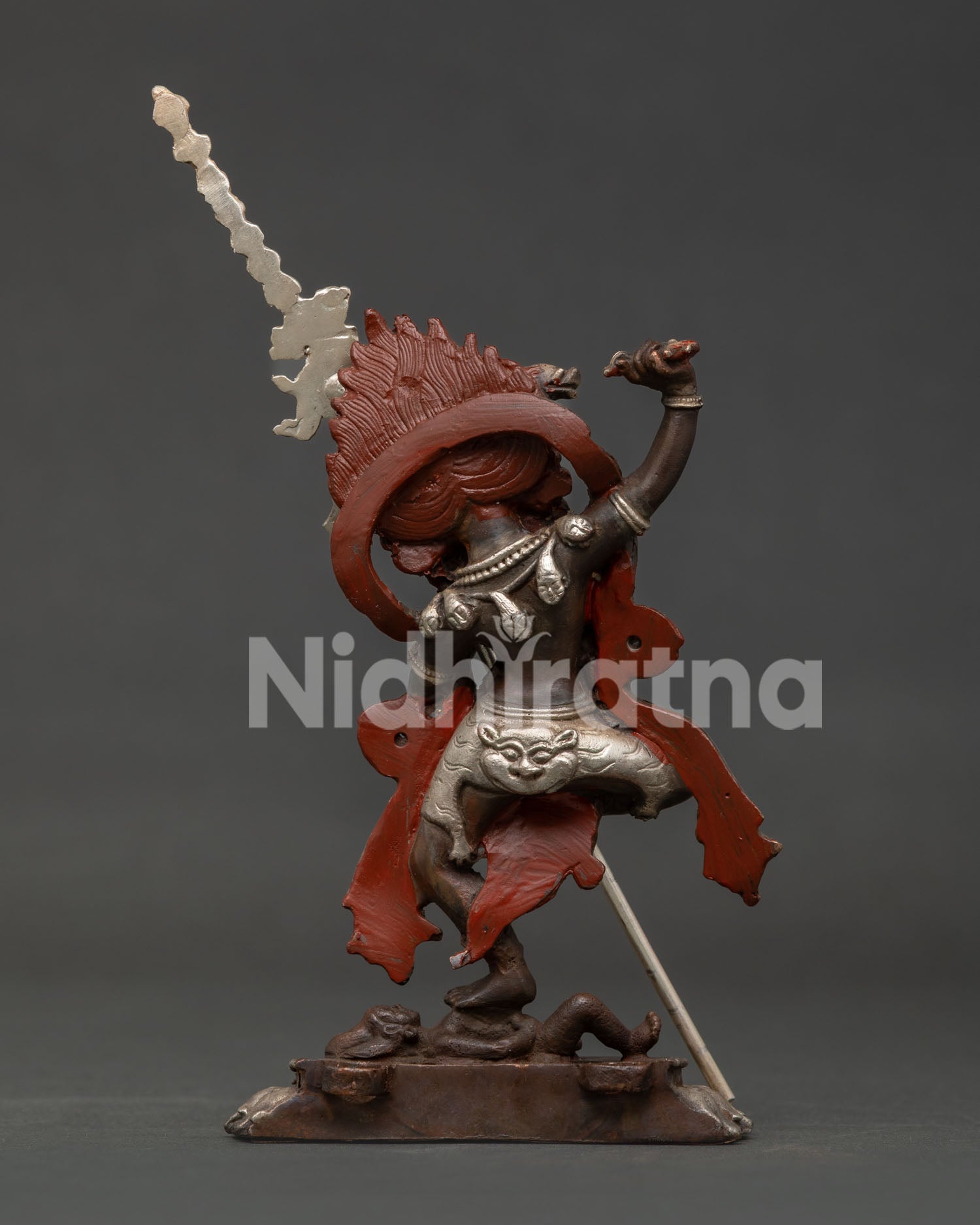 Detailed Dorje Phagmo statue with sow head and flaming hair.