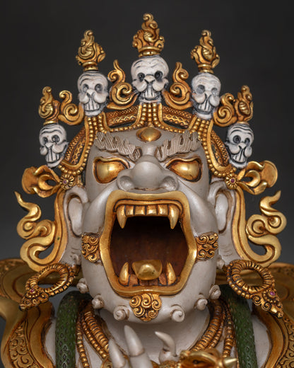 Detailed face close-up of Dorje Khadro statue, wrathful Buddhist deity carving