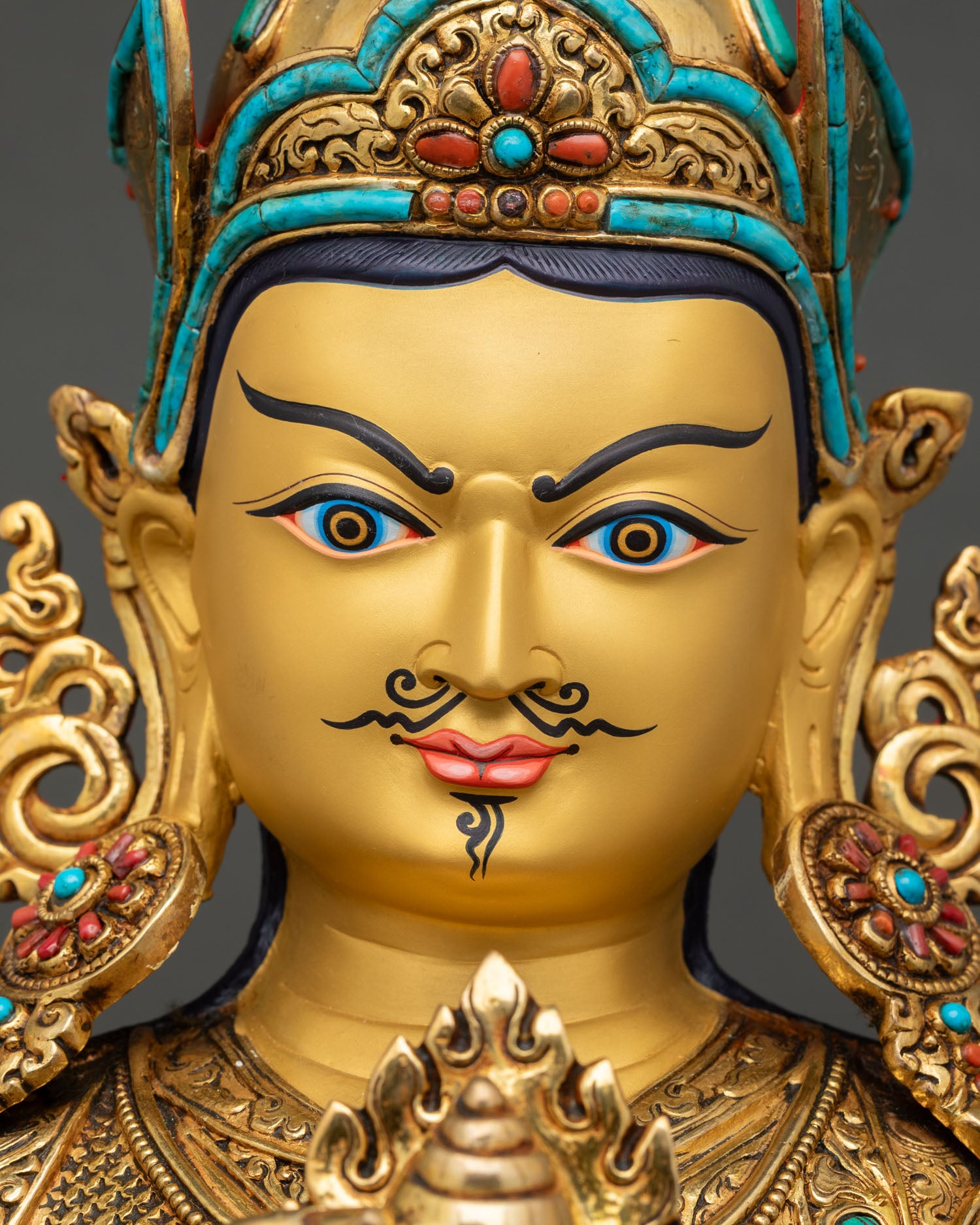 detailed face close up of guru orgyen norlha, serene expression with hand painted gold finish