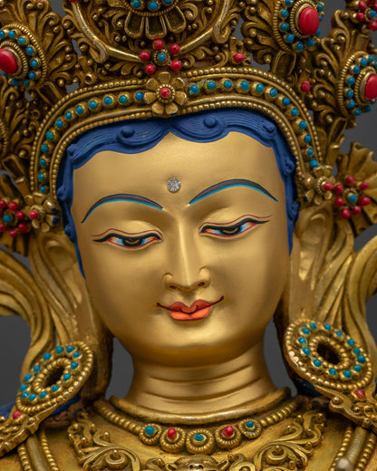 Detailed Face of Green Tara Statue with Gold Painted Finish and Traditional Newari Craftsmanship