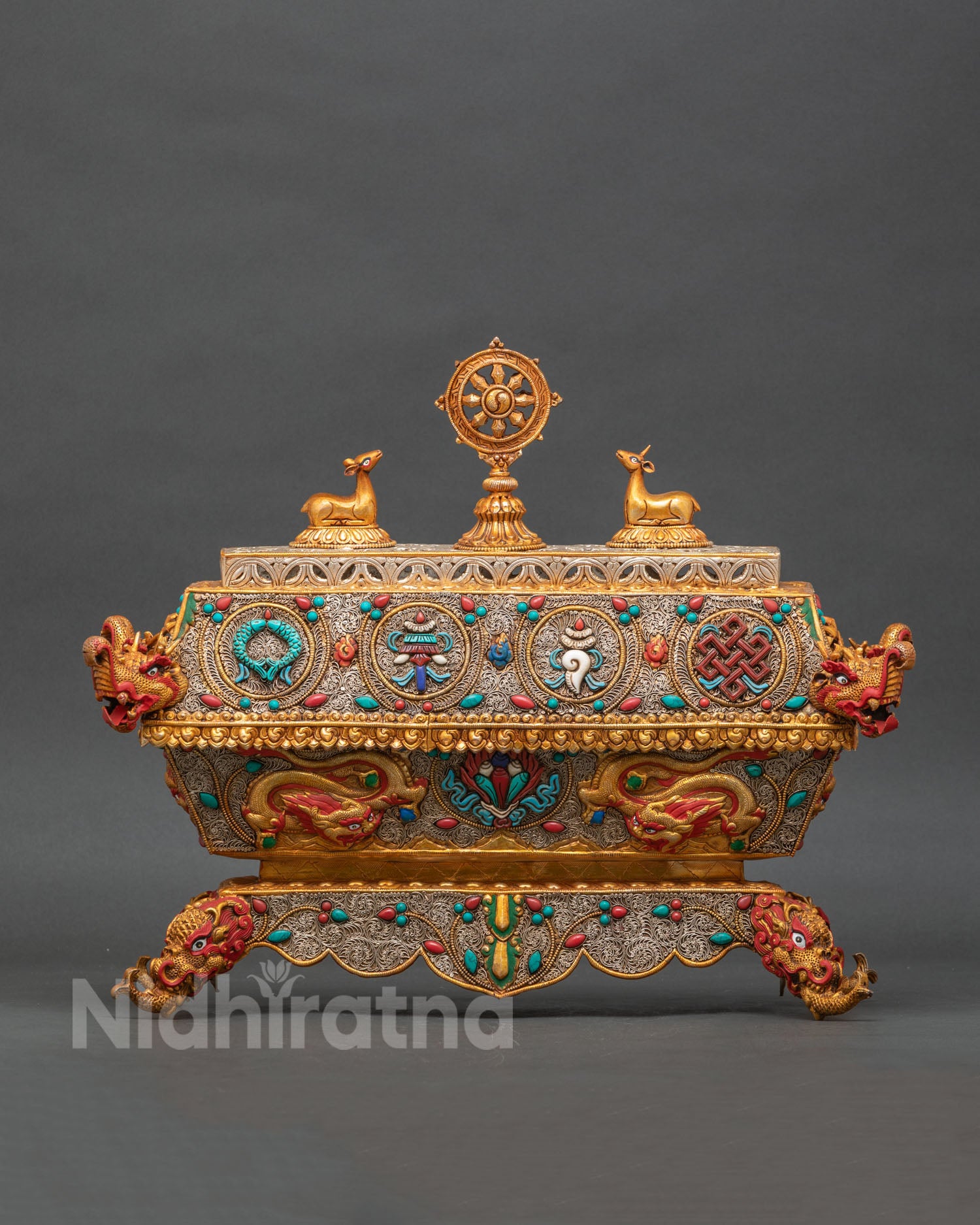 Detailed Himalayan incense burner with dragon floral reliefs and traditional Buddhist motifs.