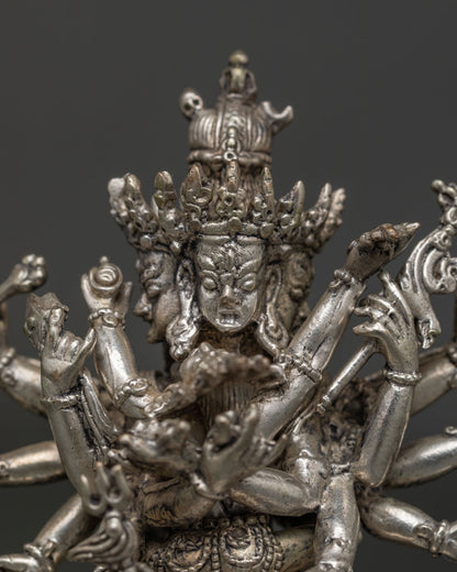 Detailed Kalachakra statue with four wrathful faces and twenty four sacred arms.
