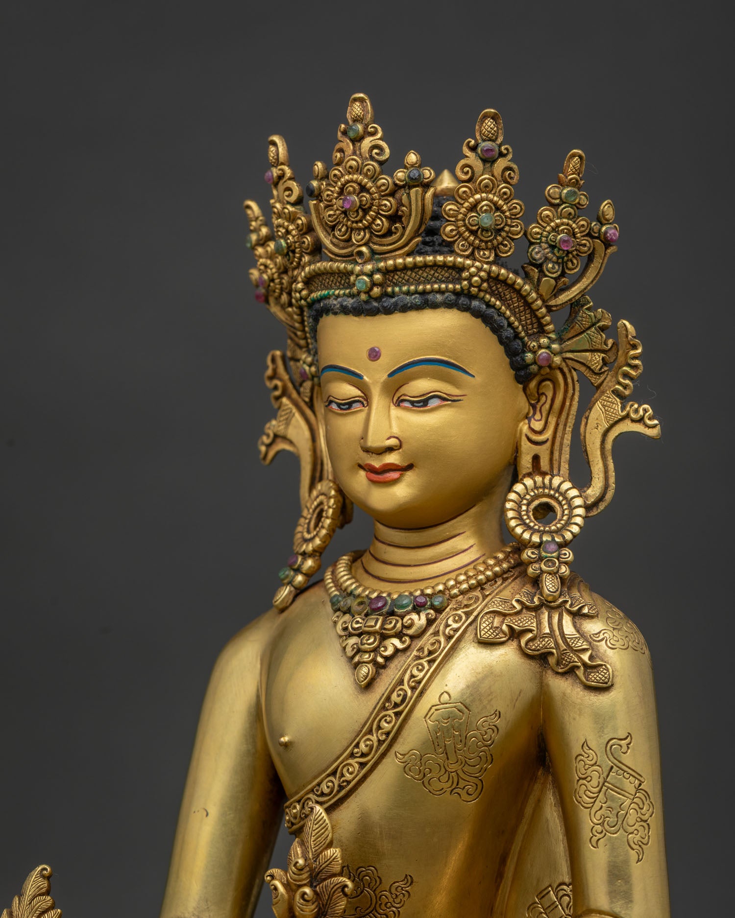 Detailed Medicine Buddha statue showing carved auspicious robe and intricate Himalayan craftsmanship