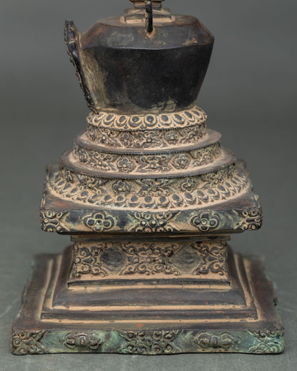 Detailed Namgyalma Stupa carving showing traditional Nepalese metal craftsmanship