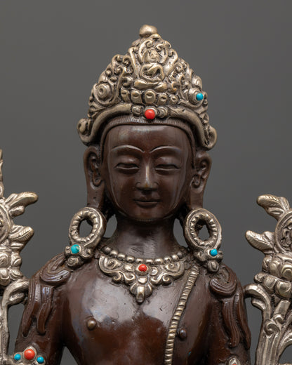 Detailed Padmapani face crown and semi precious stone ornaments.