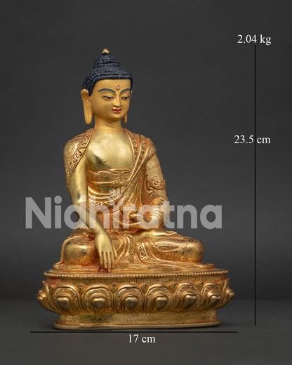 Detailed Shakyamuni Buddha face with hand carved floral robe patterns.