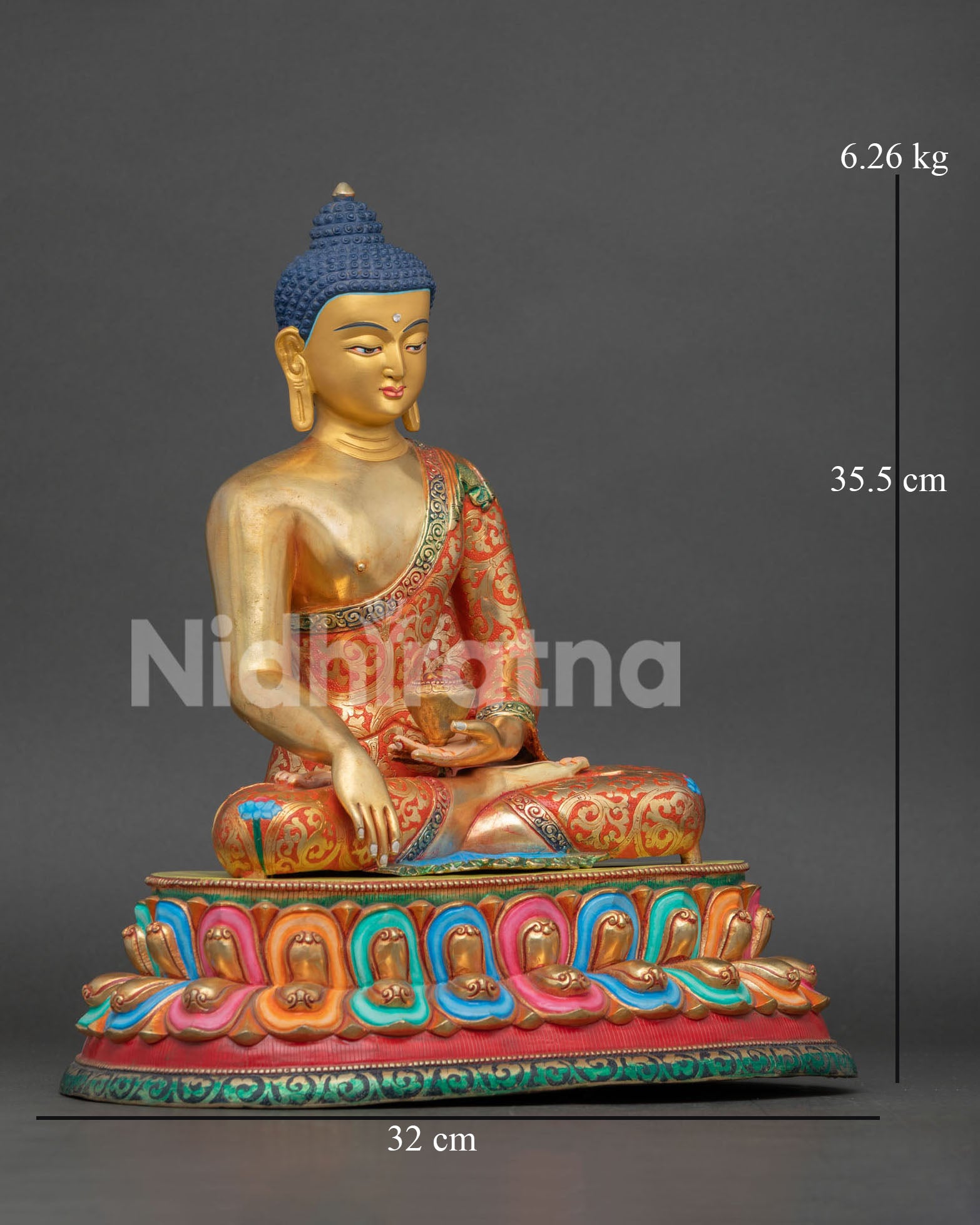 Detailed Shakyamuni Buddha sculpture showing Bhumisparsha Mudra and engraved floral monastic robes