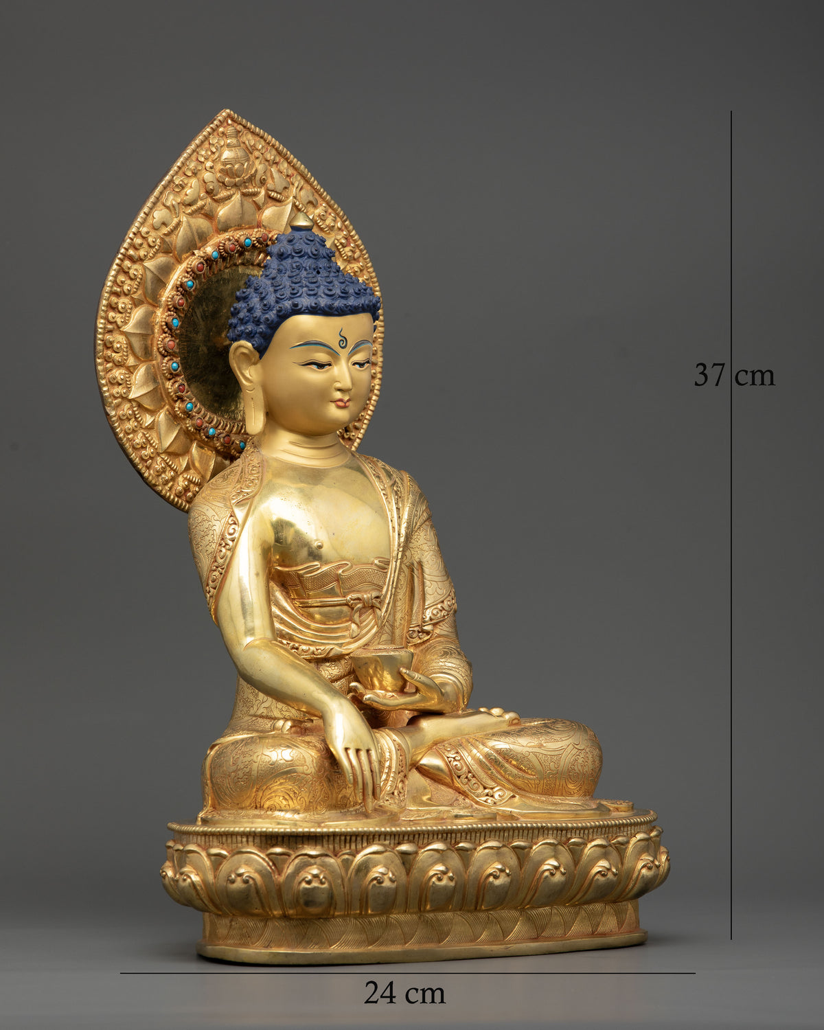 Detailed Shakyamuni Buddha Statue featuring semi-precious stone adorned halo