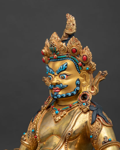 Detailed side close up of Dzambhala statue with turquoise coral inlays and lotus pedestal