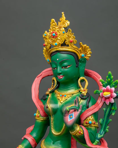 Detailed side close up of Green Tara copper statue showing jeweled crown, earrings and necklace