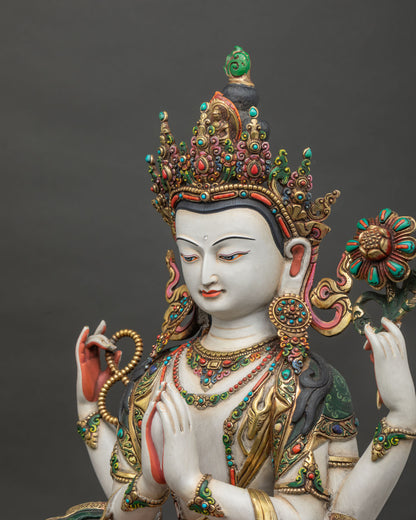 Detailed side close up of handcrafted robes on Avalokiteshvara statue