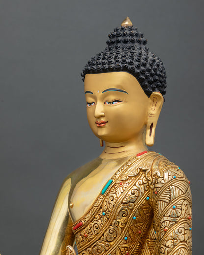 detailed side close up of medicine buddha statue with 3d carved robe details