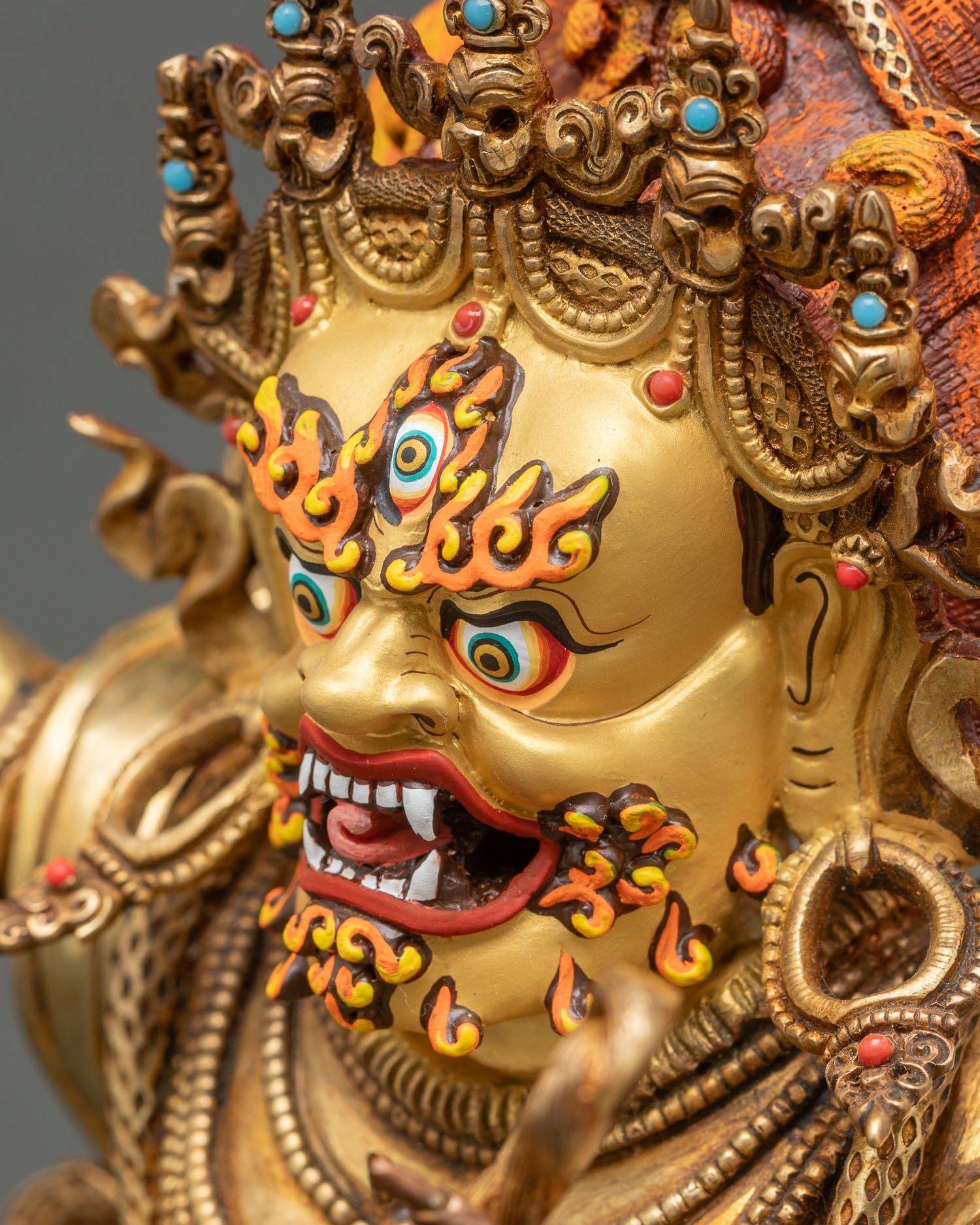 detailed side close up of vajrapani buddha statue highlighting dynamic posture