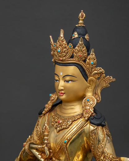 Detailed side close up Vajrasattva statue showing ornate jewelry and floral halo