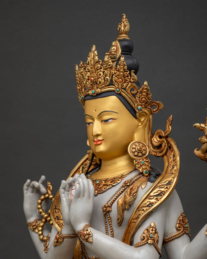 Detailed side view of Four-Armed Chenrezig statue with ornate jewelry and repoussé work