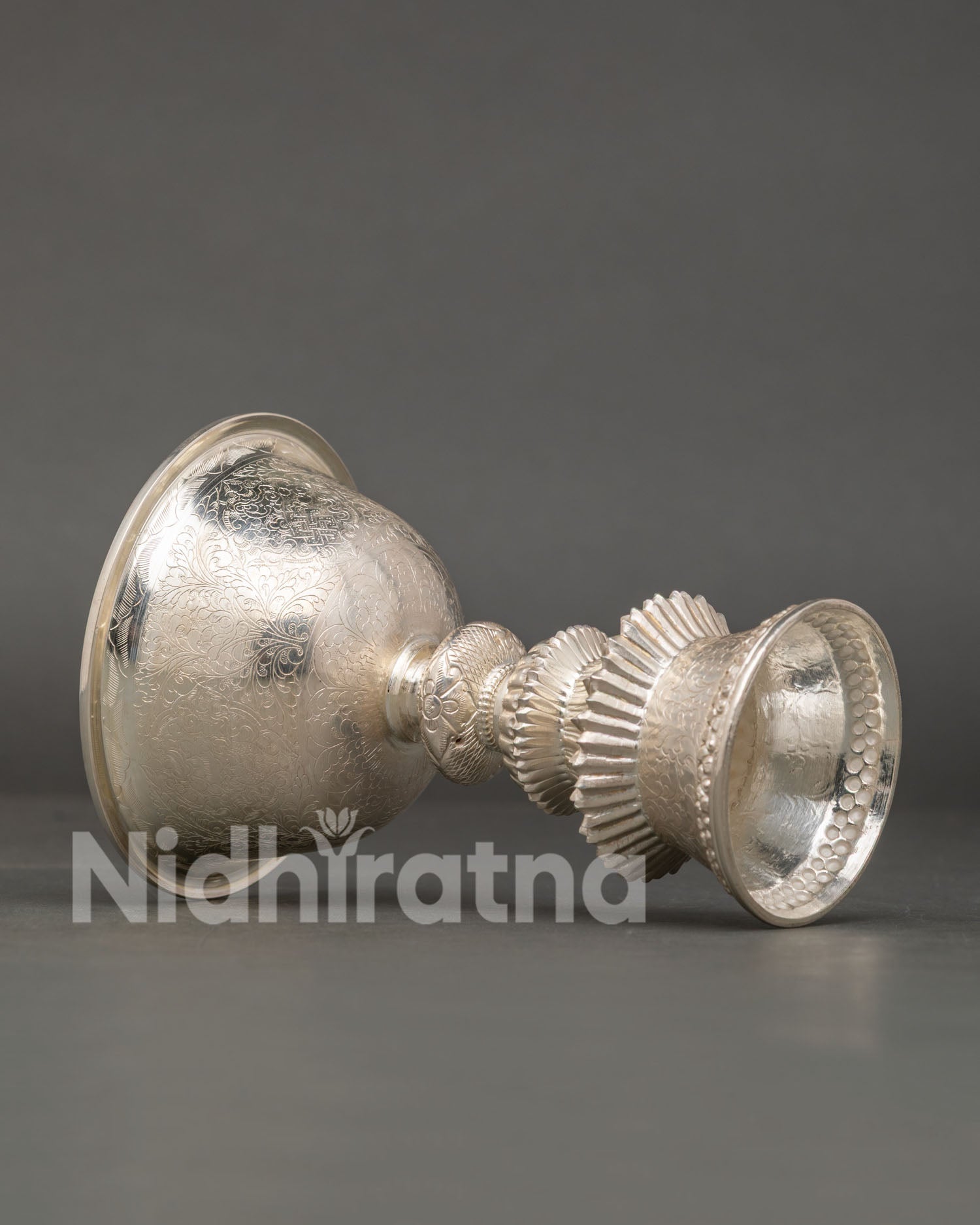 Detailed Side View of Handcrafted Silver Butter Lamp Showing Traditional Newari Craftsmanship