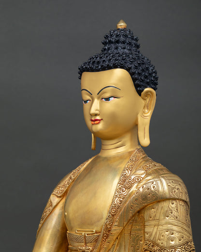 Detailed side view of Shakyamuni Buddha statue with lotus throne and ornaments