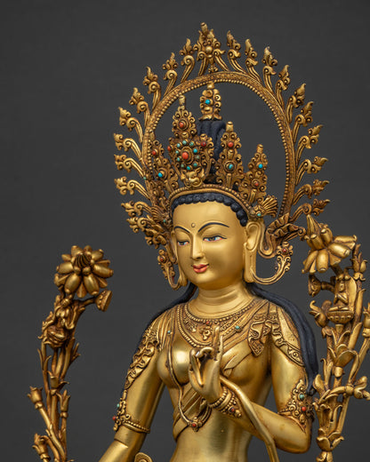 detailed side view of standing green tara showing turquoise coral and intricate ornaments