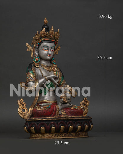 Detailed Side View of Vajrasattva Statue on Lotus Pedestal with Sacred Vajra.