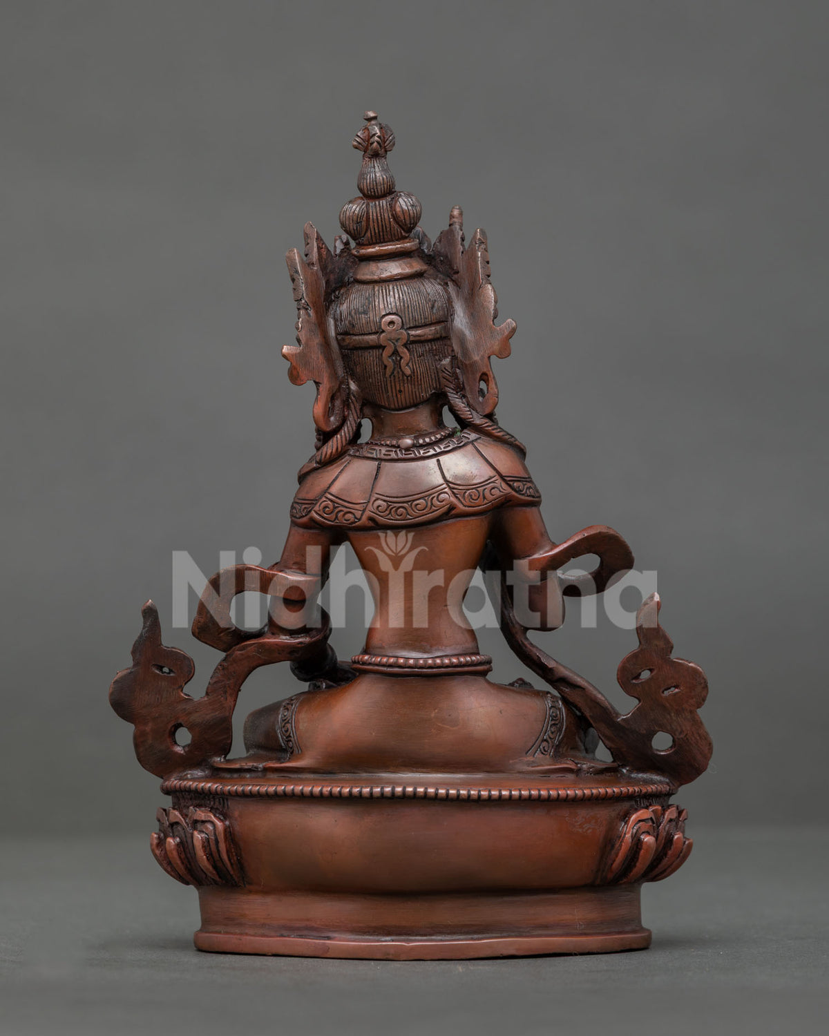 Detailed Vajrasattva statue with chemically oxidized copper surface and colorful semi precious stones.