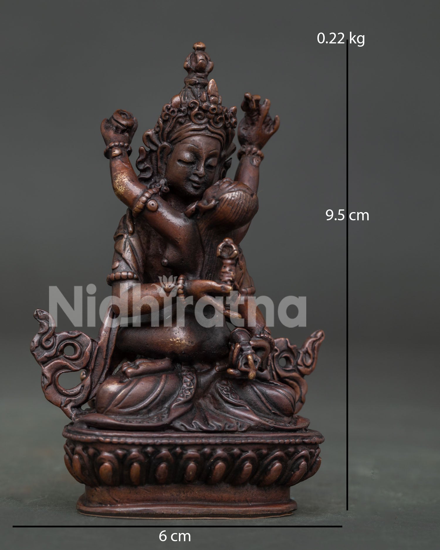 Detailed Vajrasattva with consort statue showing hand carved garments and robes.