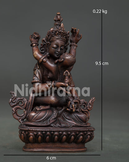 Detailed Vajrasattva with consort statue showing hand carved garments and robes.