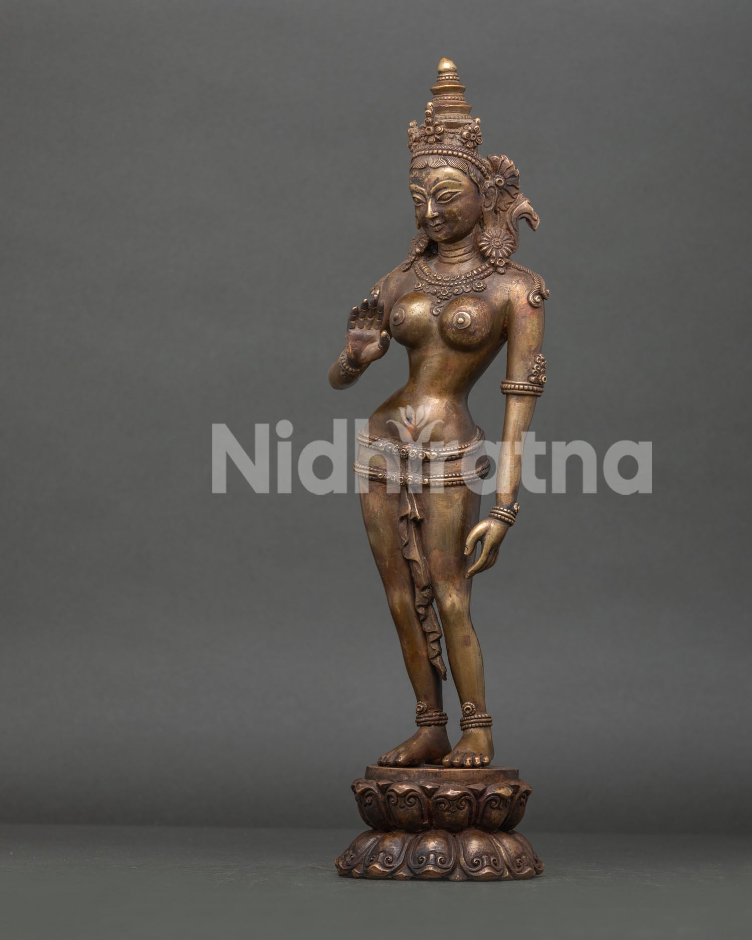 Detailed View of Green Tara Statue with Ornate Jeweled Ornaments.