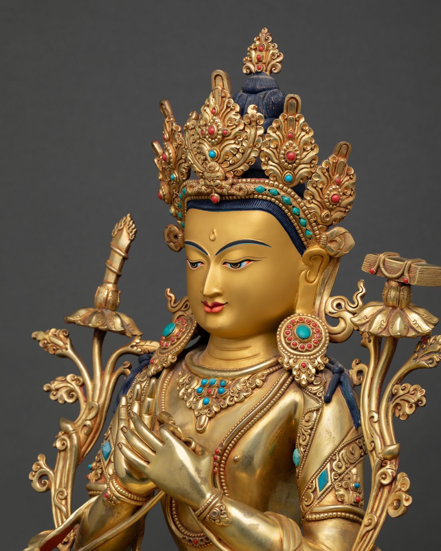 Detailed View of Manjushri Statue with Dharmachakra Mudra and Intricate 3D Carved Copper Sculpture