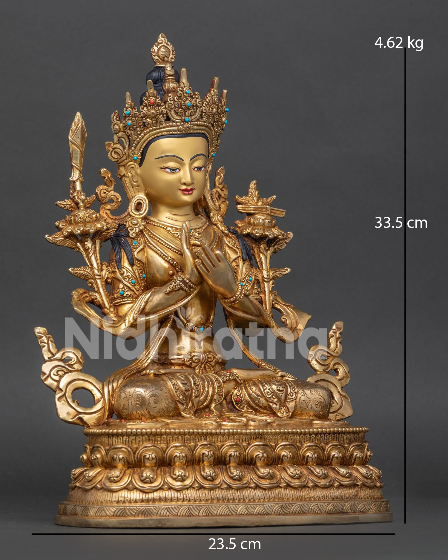 Detailed view of Manjushri Statue with wisdom sword, Prajnaparamita Sutra, and lotus stems in gold gilding