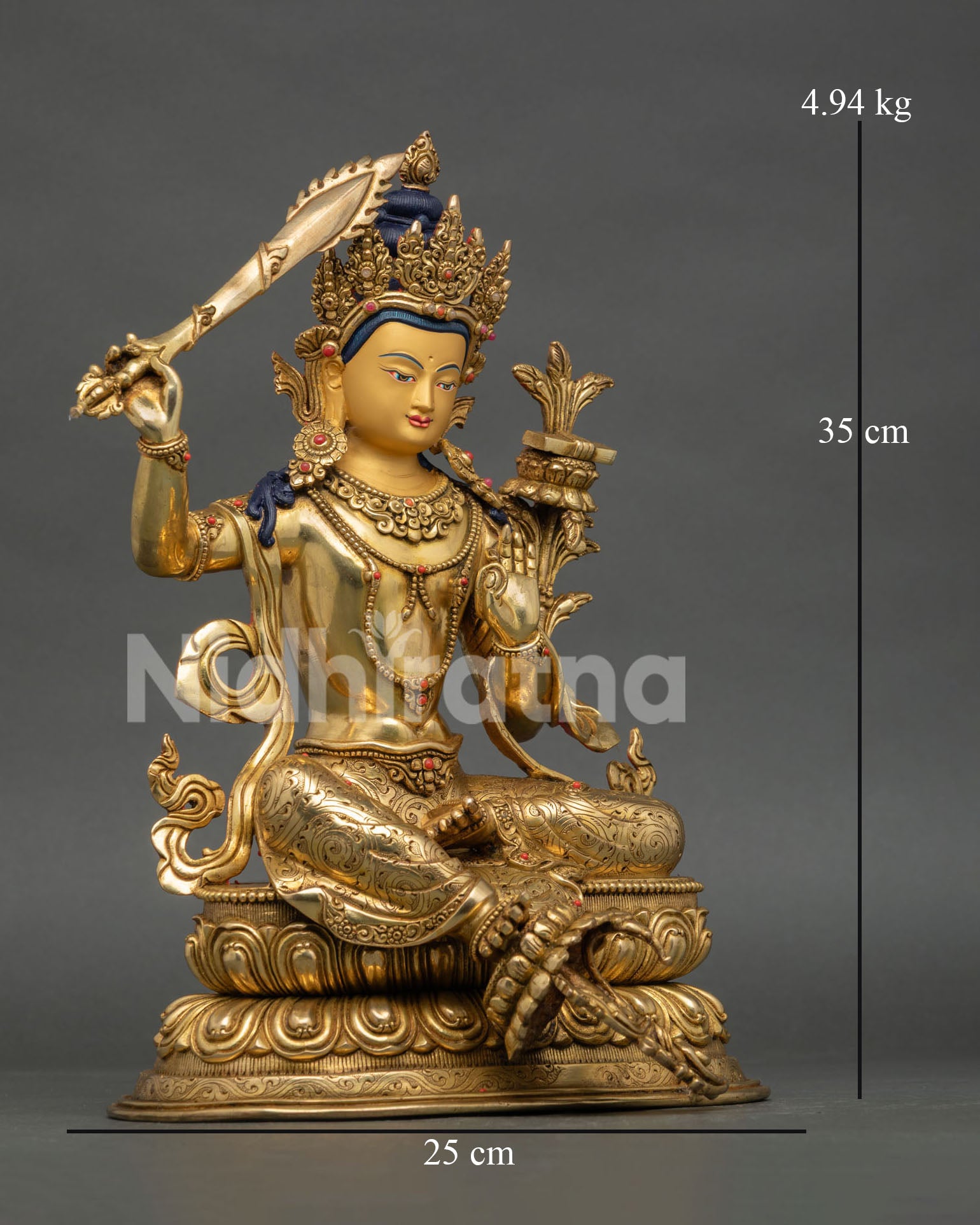 Detailed view of Manjushri wisdom sword and Prajnaparamita scripture on lotus flower
