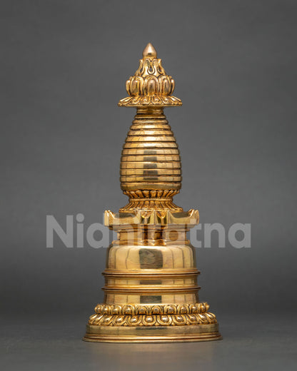 Detailed view of traditional Newari craftsmanship on a gold-plated Buddhist Kadampa Stupa