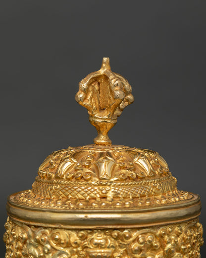 Detailed View of Traditional Newari Neshi Rice Pot with Sacred Buddhist Motifs