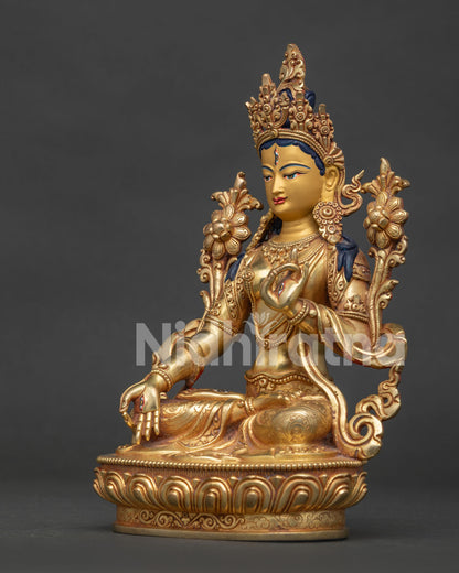 Detailed View of White Tara Silk Garment with Floral Motifs.