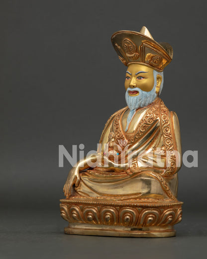 Detailed View of Zhabdrung Rinpoche Statue with White Beard and Monastic Robes.