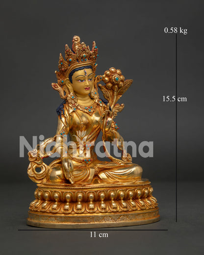 Detailed White Tara with Ornate Crown Jewelry and Flowing Garments.