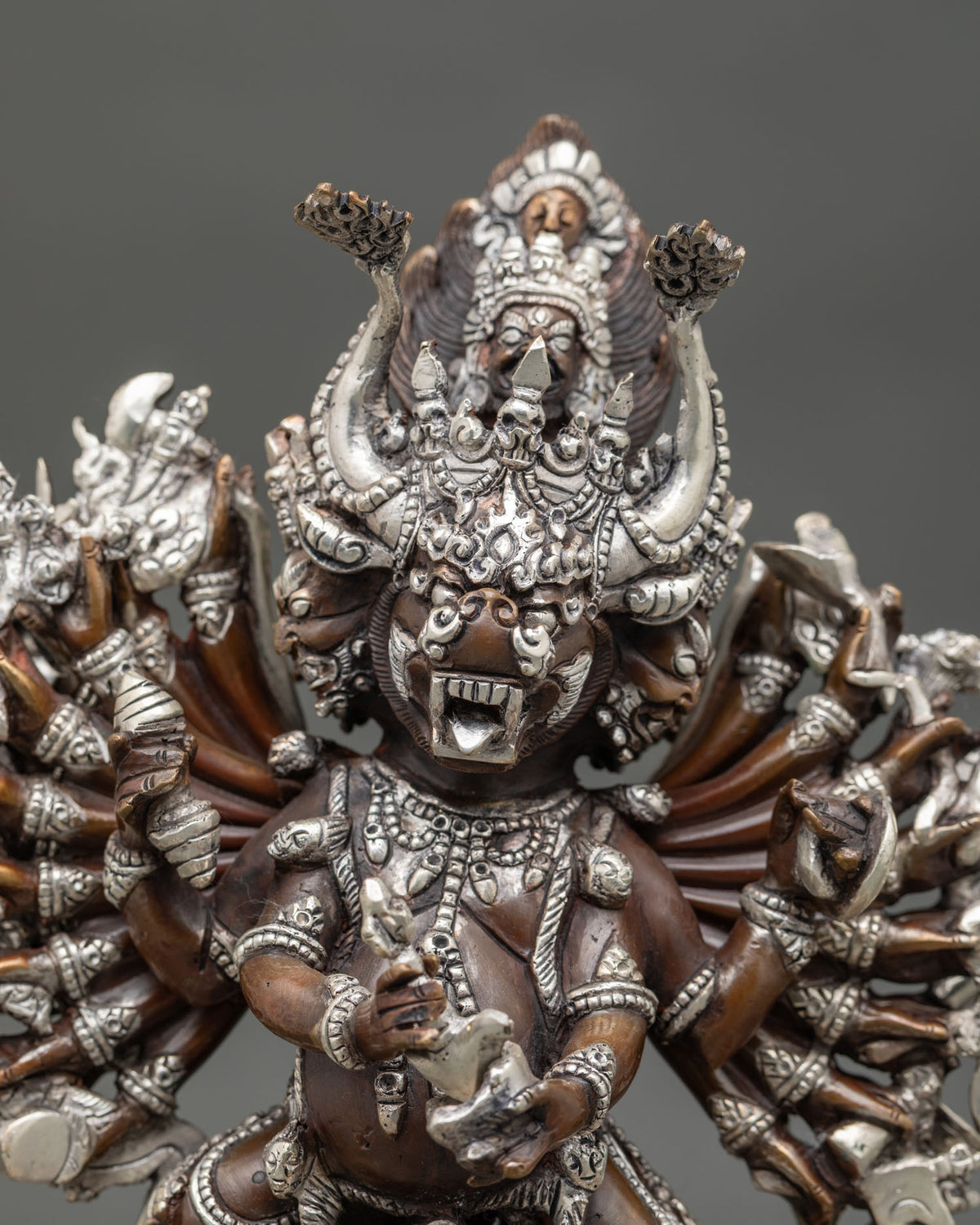 Detailed Yamantaka deity statue featuring a buffalo face and sacred implements of wrathful wisdom