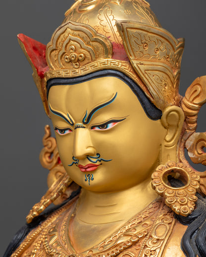 detailed Side close up face Guru Rinpoche statue wrathful compassionate expression gold gilded
