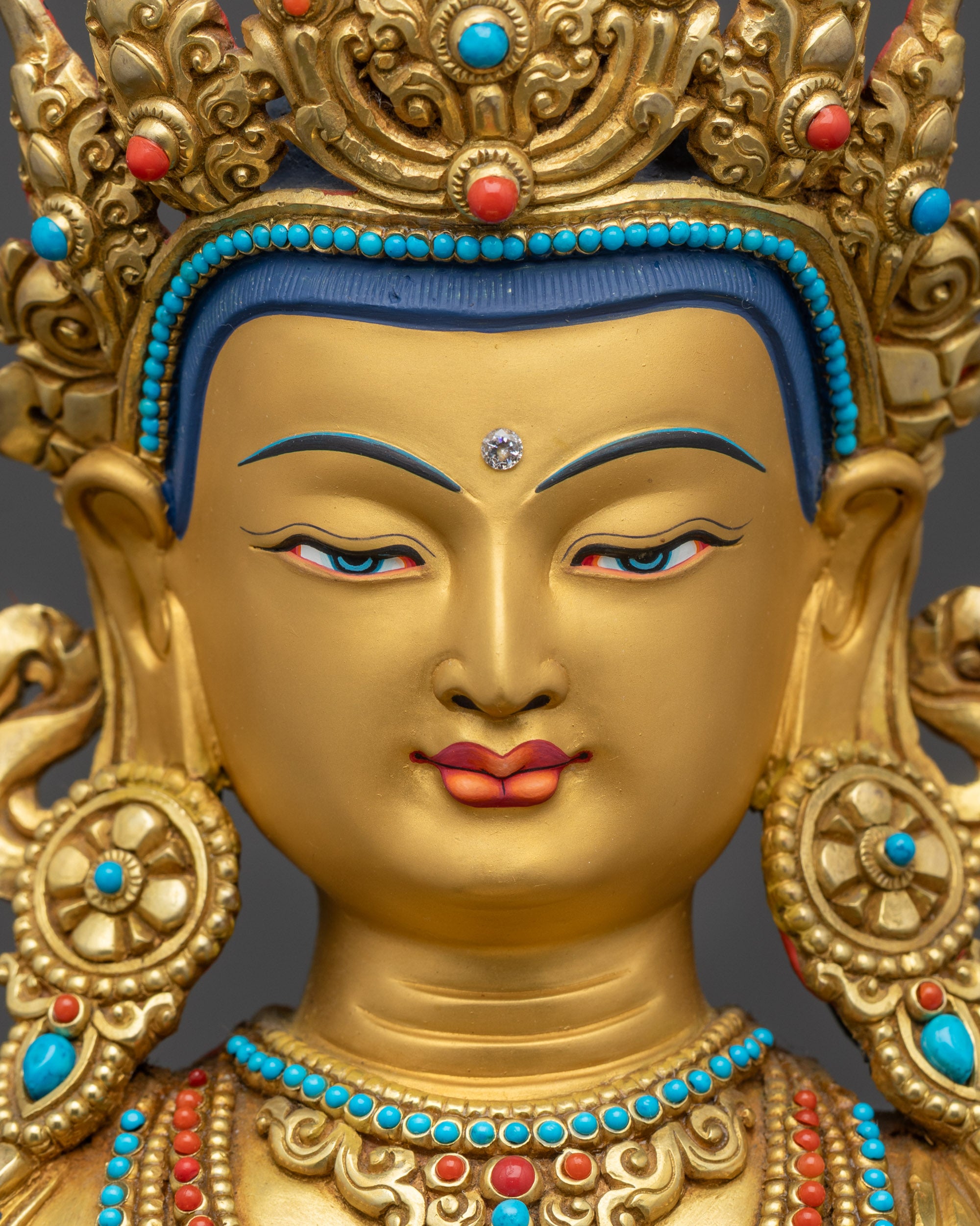 detailed close up face Amitayus statue gold gilded serene expression Newari art