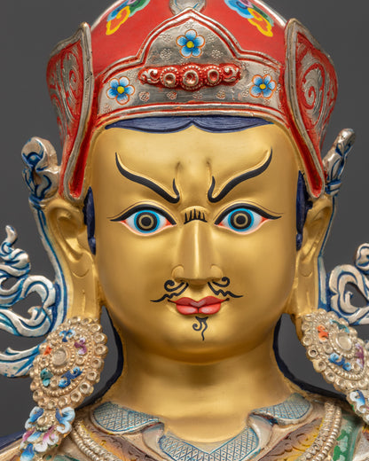 detailed close up face of Guru Rinpoche Statue with 24K gold gilding and vivid acrylic paint