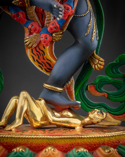 detailed crushed deity Simha Mukha statue with subdued human figure under feet
