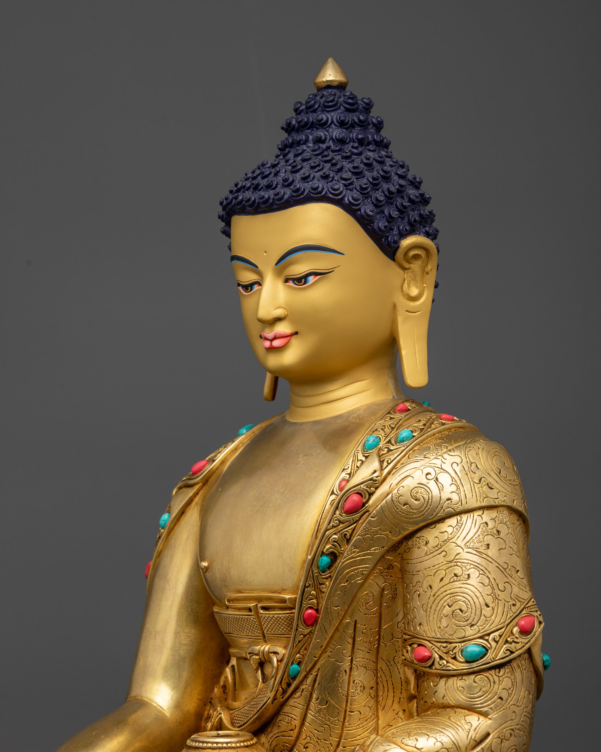 detailed side close up Shakyamuni Buddha robe with intricate carved patterns