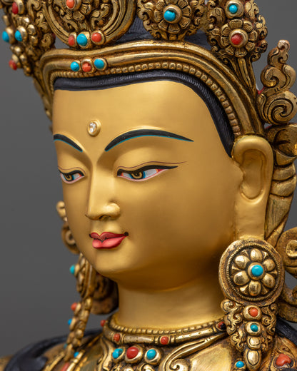 detailed side close up face of Manjushri Statue showing calm gaze and intricate crown details
