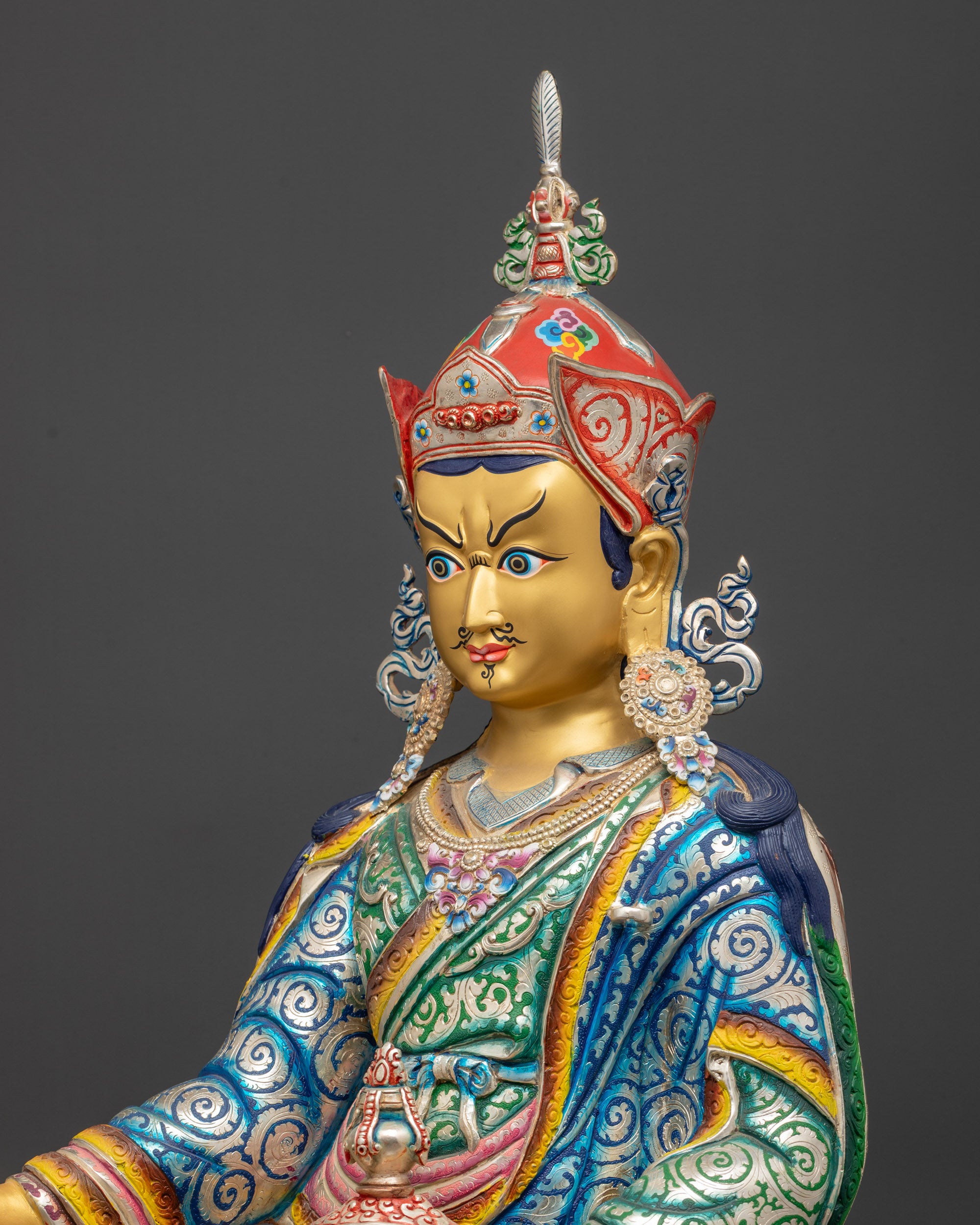 detailed side view Guru Rinpoche Padmasambhava Statue with trident and silver-plated robe
