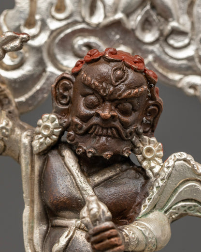  detailed vajra in hand, symbolizing spiritual power and protection on Dorje Drolo statue