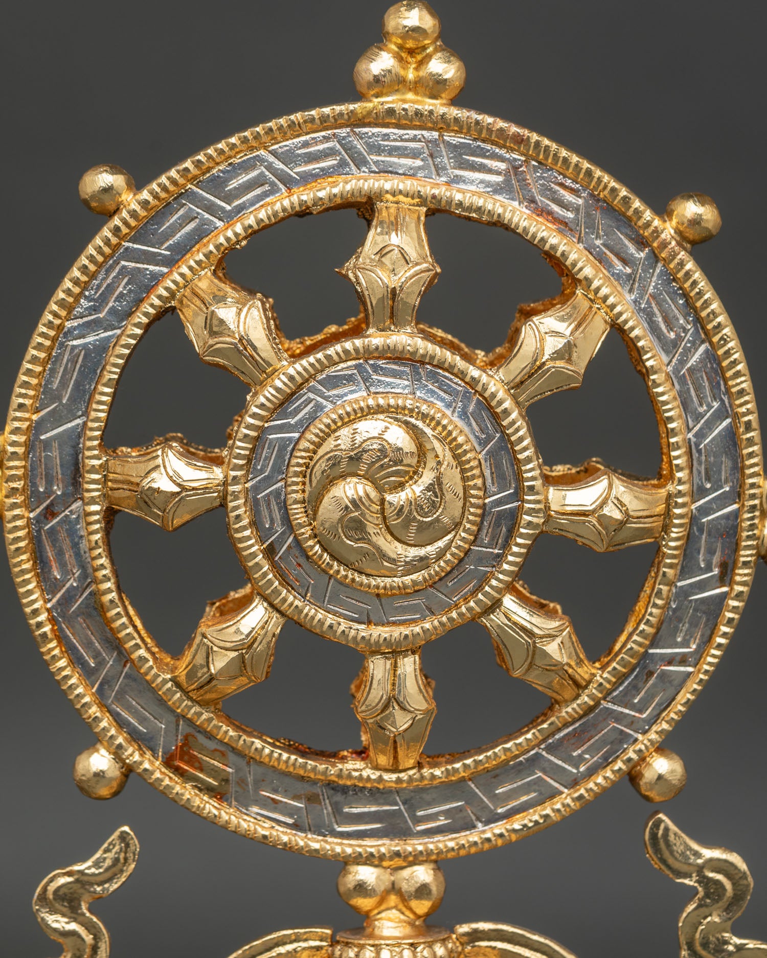 Dharma Wheel hub Three Treasures Buddha Dharma Sangha