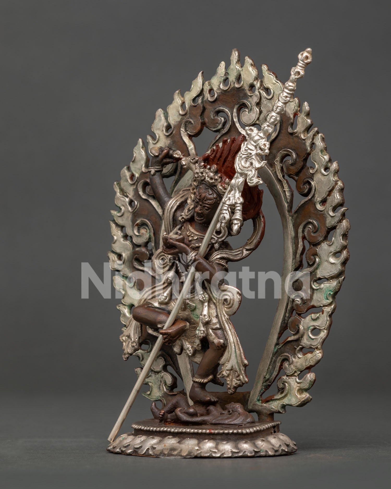 Dorje Phagmo holding kartika kapala and khatvanga staff.